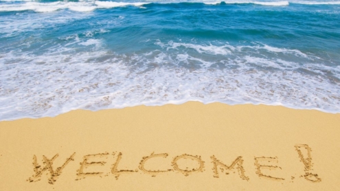 inscription_welcome_sand_sea_resort_waves